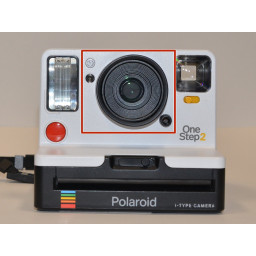 Замена объектива Polaroid OneStep 2